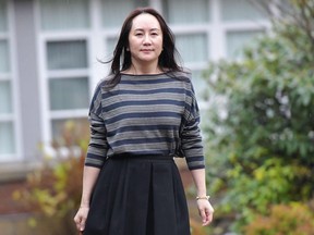 Huawei Chief Financial Officer, Meng Wanzhou, leaves her Vancouver home to attend British Columbia Supreme Court, in Vancouver, BC Canada, on December 8, 2020.