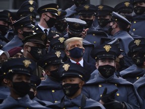 U.S. President Donald Trump joins West Point cadets during the Army-Navy football game at Michie Stadium on Dec. 12, 2020 in West Point, N.Y.