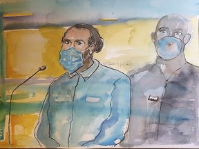 A courtroom sketch by Elisabeth de Pourquery made on November 16, 2020, shows defendant Ayoub El Khazzani sitting in the dock of the Paris Courthouse in Paris on November 16, 2020.