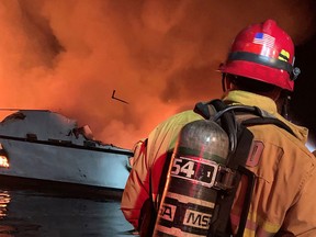 Ventura County Fire Department personnel respond to a boat fire on a 75-foot vessel off Santa Cruz Island, September 2, 2019.