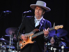 In this file photo taken July 22, 2012, Bob Dylan performs during the 21st edition of the Vieilles Charrues music festival in Carhaix-Plouguer, France.