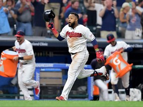 Carlos Santana of the Cleveland Indians rounds the bases on his walk-off solo home run to defeat the Boston Red Sox 6-5 at Progressive Field on August 12, 2019 in Cleveland, Ohio.