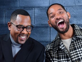 Actors Will Smith (R) and Martin Lawrence (L) arrive for the World Premiere of "Bad Boys For Life" at the TCL Chinese theatre in Hollywood on January 14, 2020. - The movie opens nationwide on January 17, 2020. (Photo by Frederic J. BROWN / AFP) (Photo by FREDERIC J. BROWN/AFP via Getty Images)