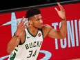 Bucks forward Giannis Antetokounmpo reacts after making a basket against the Heat during Game 4 of the second round of the 2020 NBA Playoffs at ESPN Wide World of Sports Complex, Lake Buena Vista, Fla., Sept. 6, 2020.