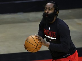 James Harden of the Houston Rockets warms up prior to facing the San Antonio Spurs at the Toyota Center on Dec. 17, 2020 in Houston, Texas.