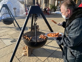 Chef Shawn Crymble works his magic with some salmon skewers on the Cowboy Cauldron at JW Marriott The Rosseau.