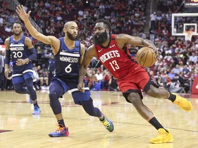 Houston Rockets guard James Harden (13) drives to the basket against Minnesota Timberwolves guard Jordan McLaughlin (6) at Toyota Center.