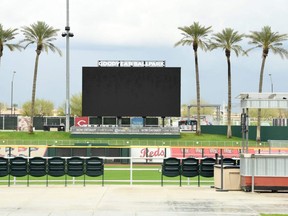 A detail of the blank scoreboard and empty seats at Goodyear Ballpark in Goodyear, Ariz., after MLB suspended spring training on March 12, 2020 due to the coronavirus outbreak.