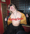 Miley Cyrus flashes the camera for Rolling Stone.