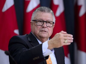Ralph Goodale gestures during a press conference at the National Press Theatre in Ottawa, Aug 6, 2019. Canada's special adviser on Iran's January shootdown of the Ukrainian Airlines jetliner that killed all 176 people on board is recommending special attention be paid to the families of victims and others who lost loved ones in the tragedy.