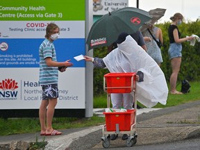 People line up for a Covid-19 test at Mona Vale Hospital in Sydney on December 18, 2020