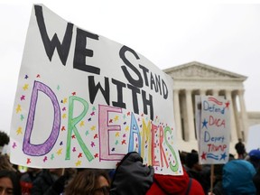 Demonstrators rally outside the U.S. Supreme Court as justices were scheduled to hear oral arguments in the consolidation of three cases before the court regarding the Trump administration's bid to end the Deferred Action for Childhood Arrivals (DACA) program in Washington, U.S., November 12, 2019.