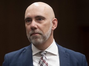 Parliamentary Budget Officer Yves Giroux waits to appear before the Commons finance committee on Parliament Hill in Ottawa, March 10, 2020.