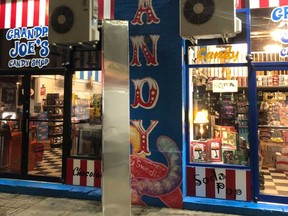 Cashing in on the mysterious appearances of three monoliths,  the owner of Grandpa Joe's Candy Shop in Pittsburgh, Pa., shared this image of a similar structure outside his store on social media.