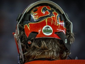 Calgary Flames goaltender Mike Smith during the pre-game skate before facing the Vegas Golden Knights in NHL hockey, the players wore a Humboldt Broncos sticker on the back of their helmets and the team will donate the 50/50 proceeds to the Humboldt Broncos.