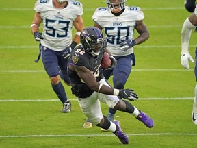 Nov 22, 2020; Baltimore, Maryland, USA; Baltimore Ravens  wide receiver Dez Bryant (88) gains fourth quarter yardage following a catch against the Tennessee Titans at M&T Bank Stadium.