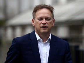 Britain's Transport Secretary Grant Shapps walks outside the Cabinet Office in London, Britain September 29, 2020.