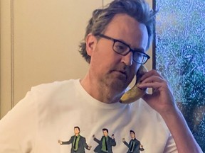 Matthew Perry wears a limited edition Friends t-shirt created to raise money for COVID-19 relief.