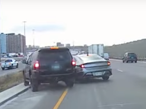 An Toyota SUV is nearly run off the road before shots are fired from a Hyundai sedan in the westbound lanes of Hwy. 401 near Hwy. 400 on Tuesday, Dec. 15, 2020.