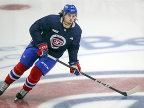 Defenceman Alexander Romanov skates across centre ice at the Bell Sports Complex in Brossard during team’s first training-camp practice on Monday.