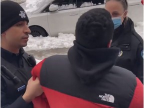 Montreal police questioned Andy Basora outside of his Villeray home on Sunday over his coat, which they said matched the description of one that was reported stolen in December.