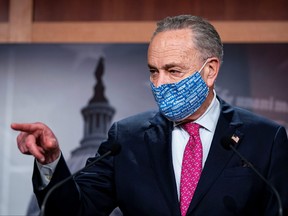 Senate Majority Leader Chuck Schumer (D-NY) speaks to the media during a news conference in the U.S. Capitol in Washington, Jan. 26, 2021.