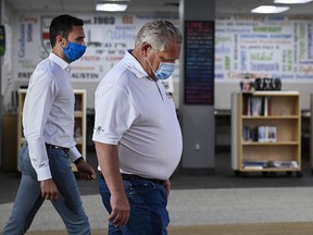 Ontario Premier Doug Ford, right, and Education Minister Stephen Lecce at Father Leo J. Austin Catholic Secondary School in Whitby July 30, 2020.