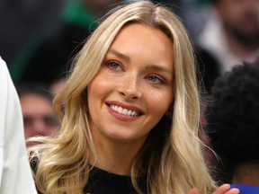 Model Camille Kostek watches the game between the Boston Celtics and the Denver Nuggets during the second half at TD Garden on Dec. 6, 2019 in Boston, Mass.