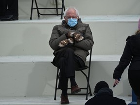 Former presidential candidate, Senator Bernie Sanders sits in the bleachers on Capitol Hill before Joe Biden is sworn in as the 46th U.S. President on Jan. 20, 2021, at the U.S. Capitol in Washington, D.C.