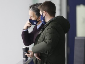 Toronto Maple Leafs general manager Kyle Dubas oversees things at practice with Brendan Shanahan on Tuesday.