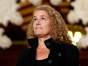In this July 13, 2017 file photo, former astronaut Julie Payette takes part in a news conference announcing her appointment as Canada's next Governor General, in the Senate foyer on Parliament Hill in Ottawa.