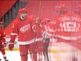 Detroit Red Wings forward Bobby Ryan is congratulated by teammates after scoring a goal against the Columbus Blue Jackets on Monday. Ryan scored both goals in Detroit's 3-2 loss.