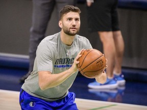 Dallas Mavericks forward Maxi Kleber (42) warms up before the game against the Miami Heat at the American Airlines Center.