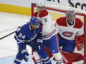 Montreal Canadiens Ben Chiarot D (8) and Toronto Maple Leafs Wayne Simmonds RW (24) spar in front of the net during the second period in Toronto on Wednesday January 13, 2021.
