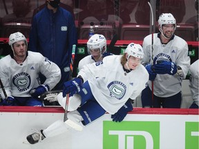 Vancouver Canucks' Adam Gaudette goes over the boards during training camp at Rogers Arena on Jan. 5, 2021.