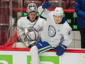 Olli Juolevi hops the boards during a Jan. 6 training camp scrimmage.