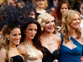 Sarah Jessica-Parker, Kristin Davis, Kim Cattrall and Cynthia Nixon pose as they arrive at the U.K. premiere of "Sex and the City 2" in Leicester Square, London, May 27, 2010. A revival of the hit show will come to HBO Max, the network announced Sunday, Jan. 10, 2021, and will star all of its original leads except Cattrall.