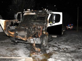 A tow truck set on fire outside of a home in Whitchurch-Stouffville on Monday, Jan. 18 2021.