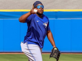 Toronto Blue Jays infielder Vlad Guerrero, Jr. takes infield practice during spring training.