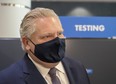 Ontario Premier Doug Ford tours the COVID-19 testing centre in Terminal 3 at Pearson Airport in Toronto on February 3, 2021.