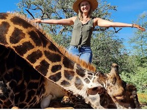 Merelize van der Merwe with a downed giraffe.