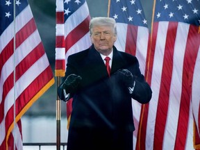 In this file photo taken Jan. 6, 2021, U.S. President Donald Trump greets supporters on The Ellipse near the White House in Washington, D.C.