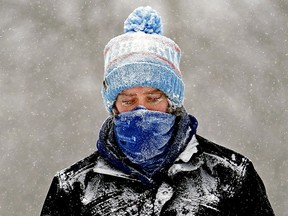 A frosty-faced man takes a walk in Edmonton's river valley on Friday Feb. 5, 2021.