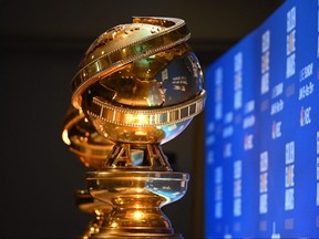 In this file photo taken on Dec. 9, 2019 Golden Globe trophies are set by the stage ahead of the 77th Annual Golden Globe Awards nominations announcement at the Beverly Hilton hotel in Beverly Hills.
