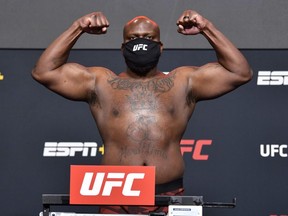 In this UFC handout, Derrick Lewis poses on the scale during the UFC weigh-in at UFC APEX on Feb. 19, 2021 in Las Vegas, Nevada.
