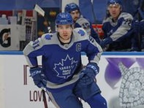 Maple Leafs captain John Tavares, shown here, spent some time playing alongside Auston Matthews and Mitch Marner on Monday night against Calgary. The trio was held off the scoresheet.