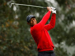FILE PHOTO: Golf - The Masters - Augusta National Golf Club - Augusta, Georgia, U.S. - November 15, 2020 Tiger Woods of the U.S. on the 4th hole during the final round REUTERS/Mike Segar/File Photo ORG XMIT: FW1