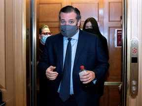 U.S. Senator Ted Cruz (R-TX) wears a mask while departing the U.S. Capitol in Washington, D.C., Feb. 13, 2021.