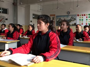 Residents at the Kashgar city vocational educational training centre attend a Chinese lesson during a government organized visit in Kashgar, Xinjiang Uighur Autonomous Region, China, Jan. 4, 2019.