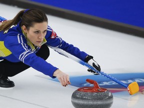 Team Alberta skip Laura Walker makes a shot at the Scotties Tournament of Hearts in Calgary, Alta., Friday, Feb. 19, 2021.THE CANADIAN PRESS/Jeff McIntosh